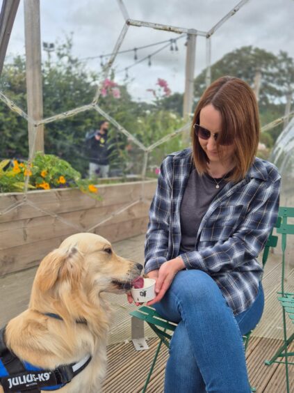 Laura treating Turner to a cup of dog icecream at Forest Farm Dairy