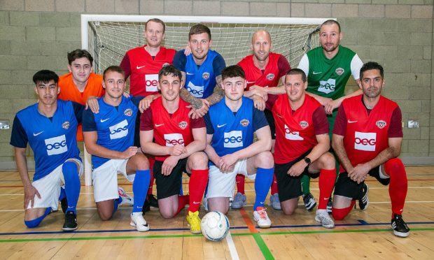 The Aberdeen Futsal Academy squad heading for Austria with Grant Campbell pictured front row, third from left.