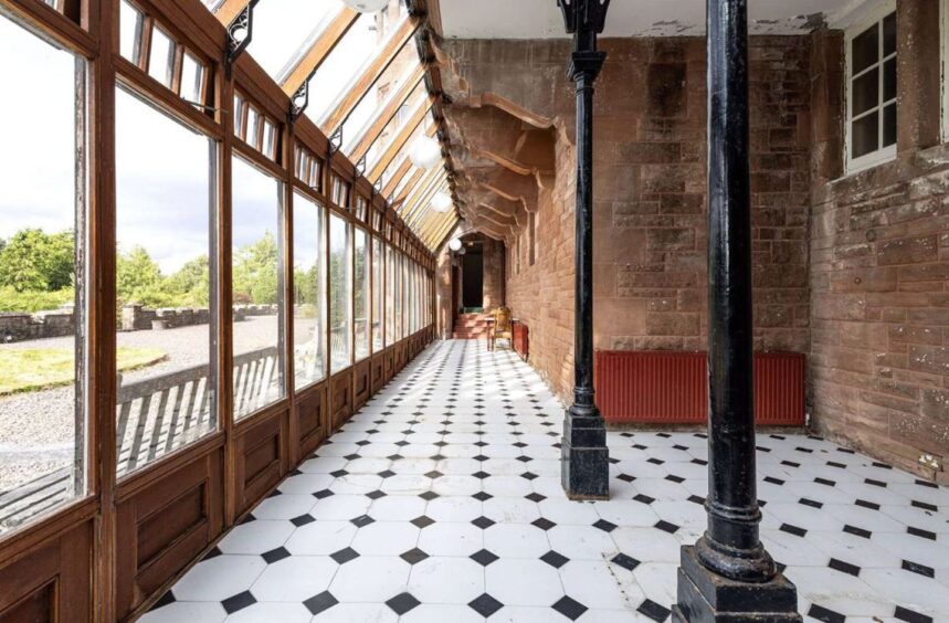 The glass-covered conservatory.