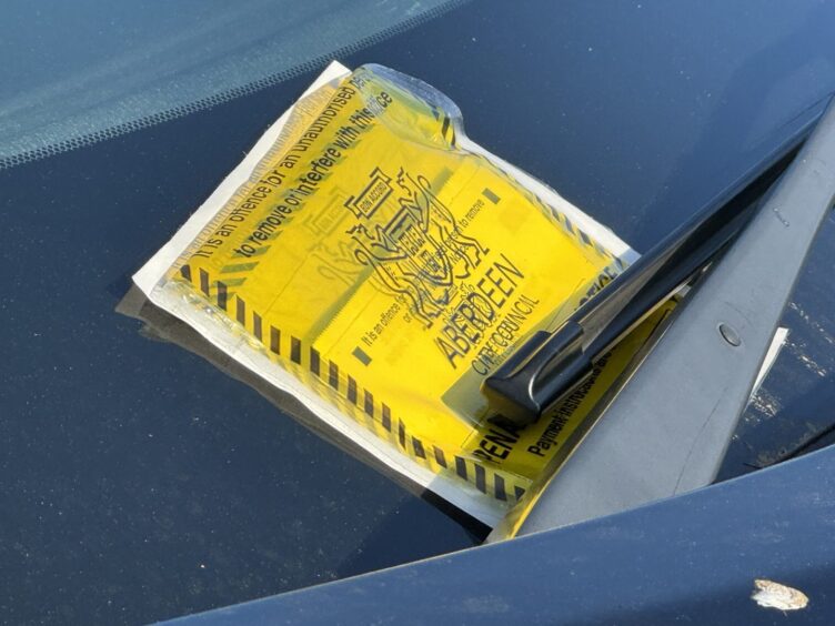 Fine slip on car parked at Aberdeen beach spot.