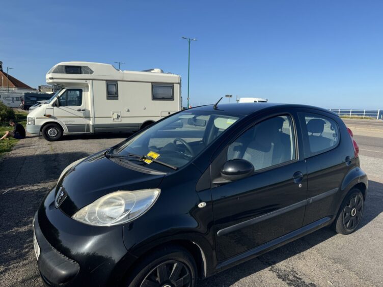 Car parked at the spot near Aberdeen beach.