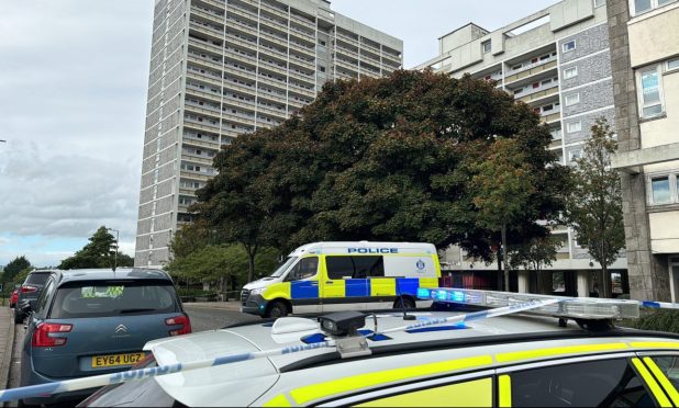 Police at the scene of the incident in Gallowgate. Image: DC Thomson.