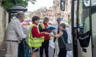 ‘We don’t worry about the weather’: Cruise passengers ignore the rain to enjoy Inverness visit