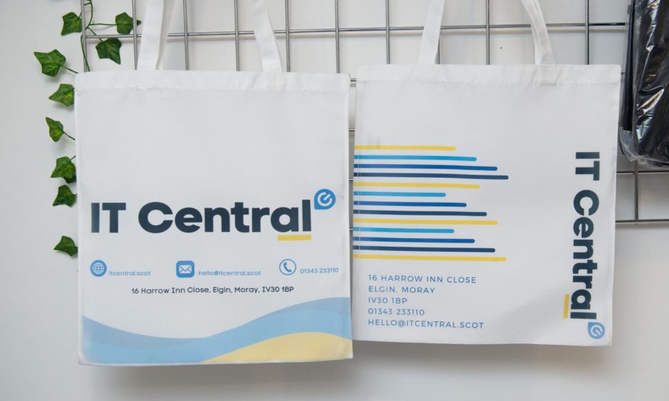 IT Central bags on hooks. 