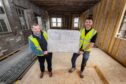 Pastor Graham Swanson and head contractor Edward Hawksley inside the former council offices getting transformed. Image: Jason Hedges/DC Thomson