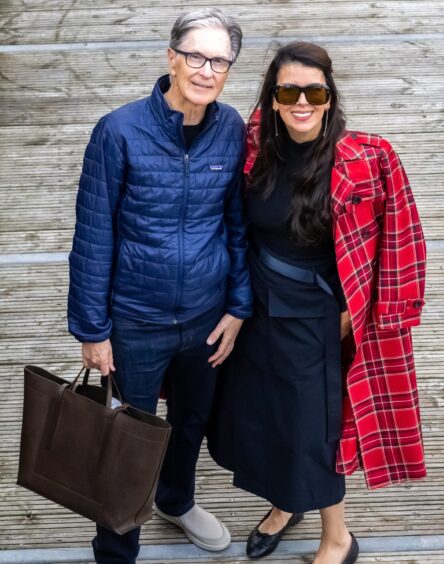 Liverpool fc chairman John W Henry and his wife Linda.