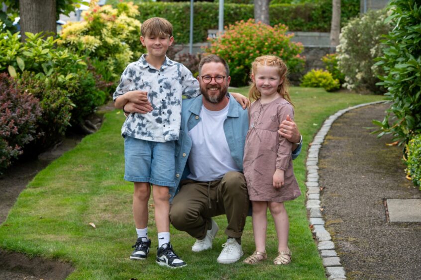 Picture of Gordon Shepherd with Dougie, 10, and Rose, 5.