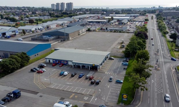 The Mastrick Lidl with the demolished site next door.