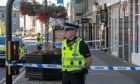 CR0049501, Louise Glen, Aberdeen.
Police Scotland have taped off the pavement on Union Street between Bridge St and Crown St from the Red Cross and the old Bank of Scotland for an investigation of an incident last night.
Sunday, August ?, 2024, Image: Kenny Elrick/DC Thomson