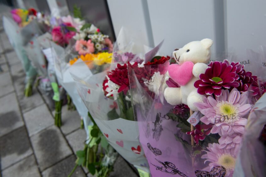 Tributes laid out Get Active at Northfield following the death of 10-year-old Jessica Rennie in February. Image: Kenny Elrick/DC Thomson