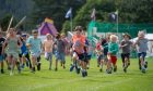 Our photographer captured the vibrant energy and joyful atmosphere of the Aboyne Highland Games. A day brimming with fun, tradition, and community spirit! Image: Kath Flannery/DC Thomson