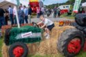 Daniel Mackay enjoying the farm equipment. Image: Kath Flannery/DC Thomson