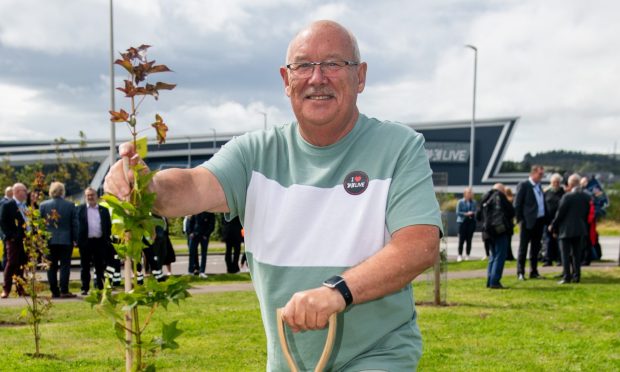 Bill planted a tree at the P&J Live today to mark the venue's fifth birthday. Image: Kath Flannery/DC Thomson