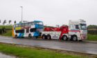 Bus on a towing vehicle at the scene. Image: Kath Flannery/DC Thomson.