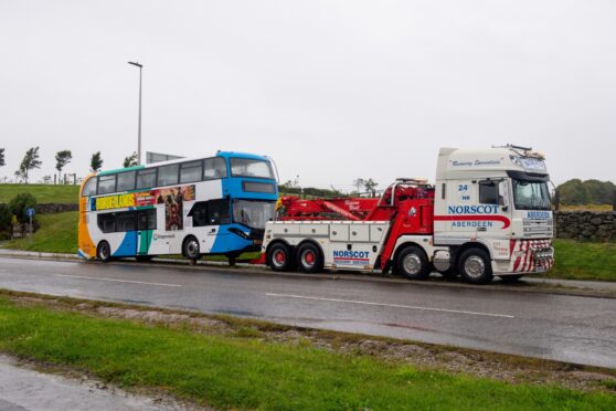 Bus on a towing vehicle at the scene. Image: Kath Flannery/DC Thomson.