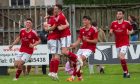 Deveronvale celebrate their winning goal against Strathspey Thistle. Image: Kami Thomson/DC Thomson