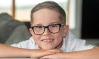 Leo Bailey at home in Ellon. The eight-year-old was suffereing from low confidence until he was helped by a hypnotherapist. Image: Kami Thomson/DC Thomson