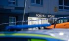 Rosehill Court was cordoned off by police. Image: Kami Thomson/DC Thomson