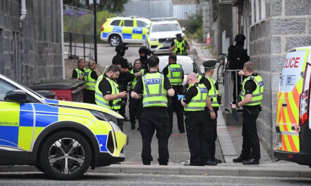 Armed police at the scene of the incident on Shoe lane. Image: Kami Thomson/DC Thomson