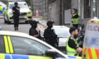 Armed police at Shoe Lane. Image: Kami Thomson/DC Thomson