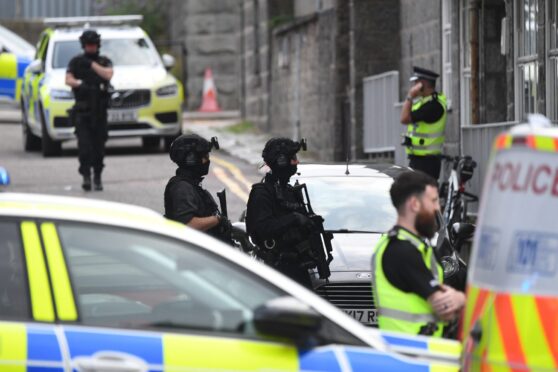 Armed police at Shoe Lane. Image: Kami Thomson/DC Thomson