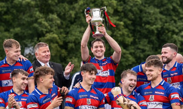 Lorne Mackay in action against Newtonmore in the 2018 Camanachd Cup final.