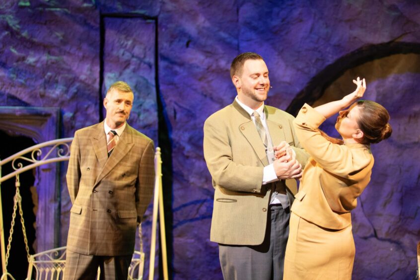 David Frances Munro as Max Detweiler, Liam Macaskill as Captain Von Trapp and Zoe Kinnear McIntyre as Elsa Schraeder in a scene from the show.