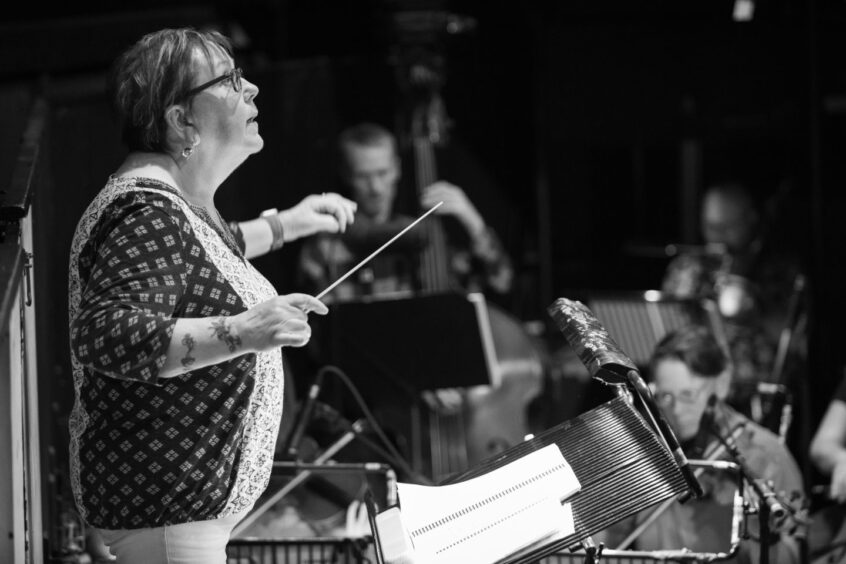 Fiona Stuart conducts the orchestra for Starlight's The Sound of Music show at Eden Court, Inverness.