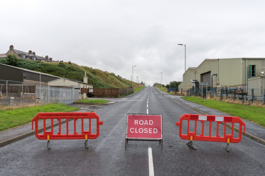 Road closed sign and barriers