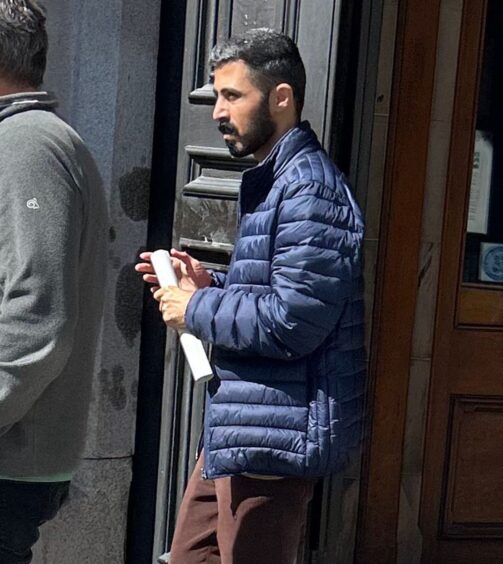 Mehrdad Esmaeili leaving Aberdeen Sheriff Court.