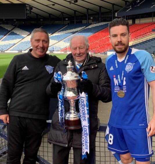 Former manager Jim McInally, Norman Crighton and Jim's son-in-law, player Ryan Dow at Hampden in May 2019 after Peterhead won League Two.