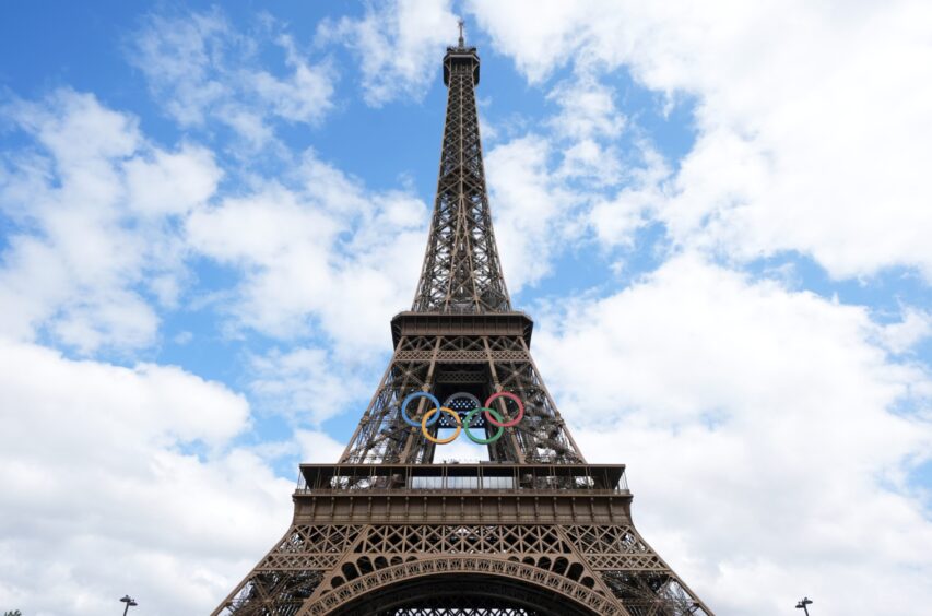 The Olympic rings on the Eiffel Tower, Paris. Image: Martin Rickett/PA Wire