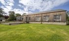 Lochside timber house with panoramic views hits the market