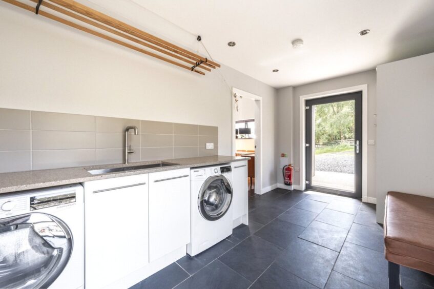 Large utility room at the Lochside property in Poolewe