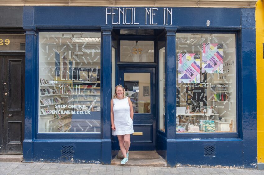 Sarah Holmes outside Pencil Me In. 