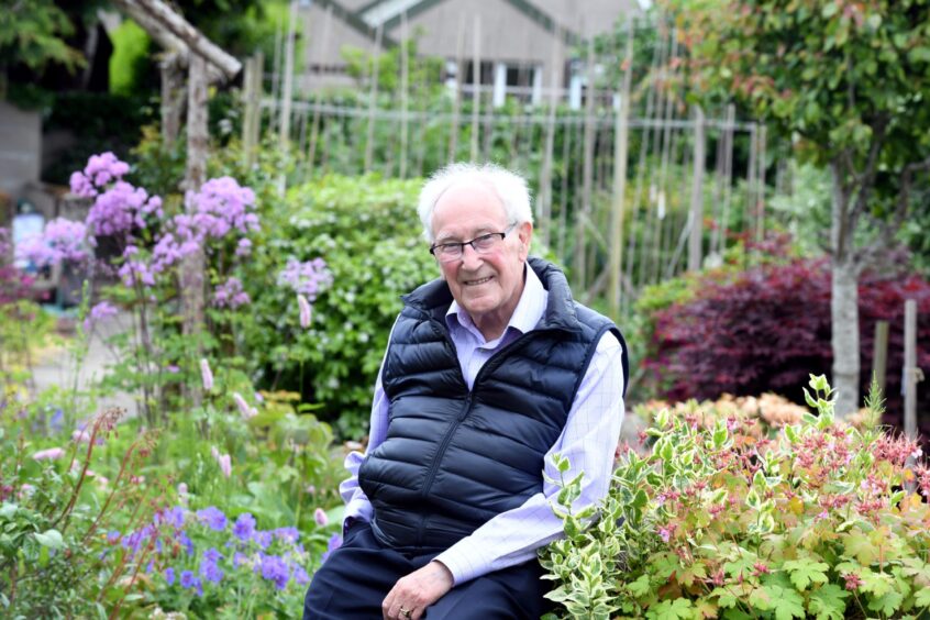 Robbie Shepherd in his garden