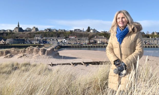 Carolle Ralph standing on Lossiemouth East Beach.