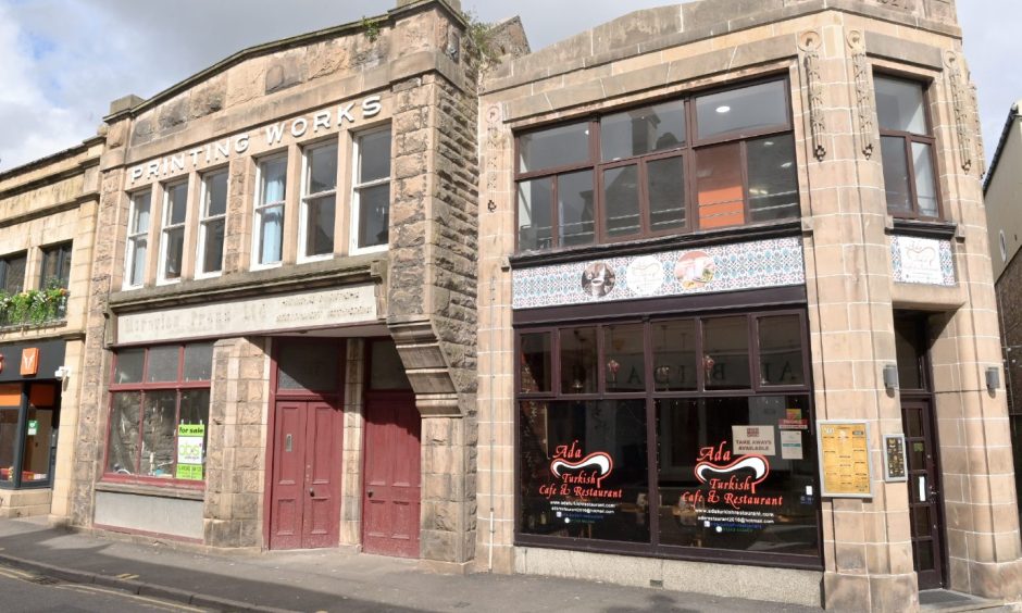 Exterior of the former Printing Works building and Ada restaurant on South Street. 