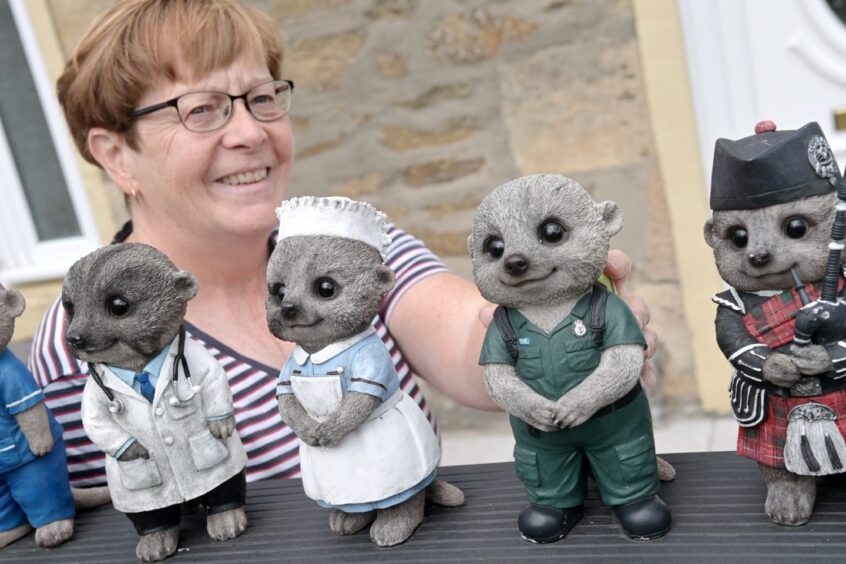 Irene Grant with meerkat ornaments 