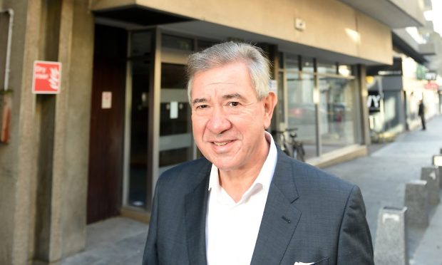 Tony Story at the site of the proposed hotel in Church Street. Image Sandy McCook/DC Thomson