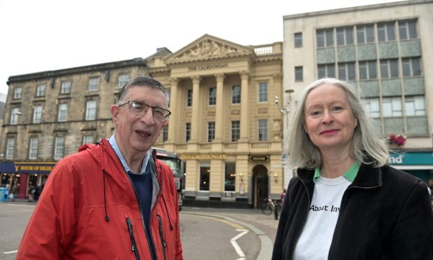 Norman Newton and Pauline Mackay outside the former Caledonian Bank in High Street. Image 
Sandy McCook/DC Thomson