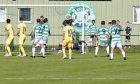 Brechin City goalkeeper Lenny Wilson, (in grey) saves a free-kick from Buckie's Jack MacIver which looked destined to be a goal. Pictures by Sandy McCook/DCT Media.