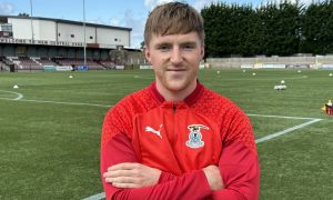 Paul Allan at the stadium with his Caley Thistle training top on