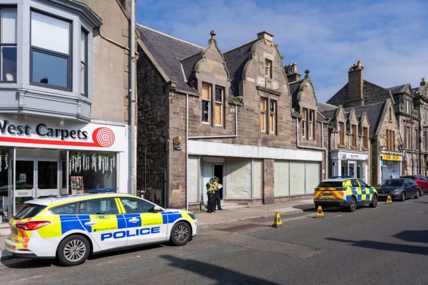 Police outside 9-11 East Church Street, Buckie.