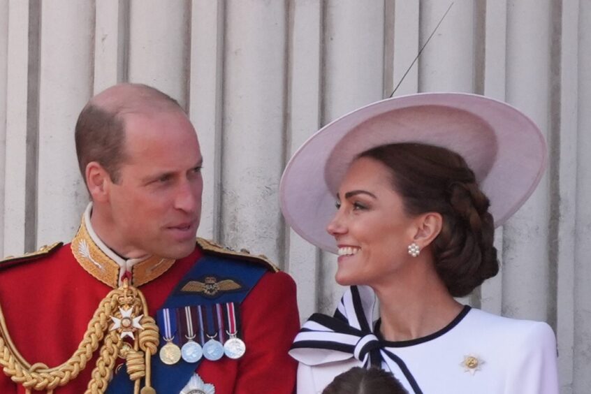 The Prince and Princess of Wales on the balcony of Buckingham Palace, London, to view the flypast following the Trooping the Colour ceremony