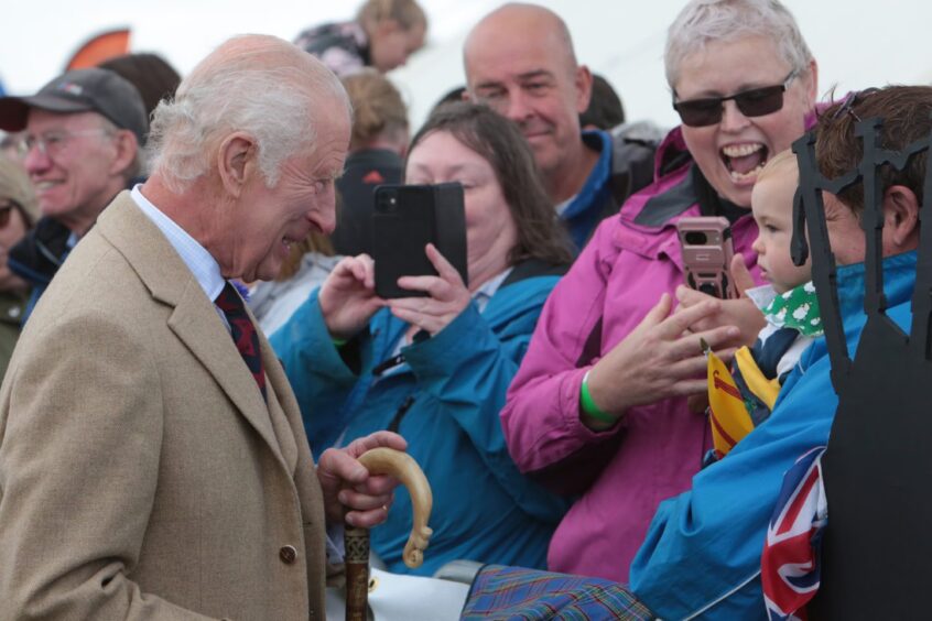 King Charles greeting fans at Mey Highland Games.