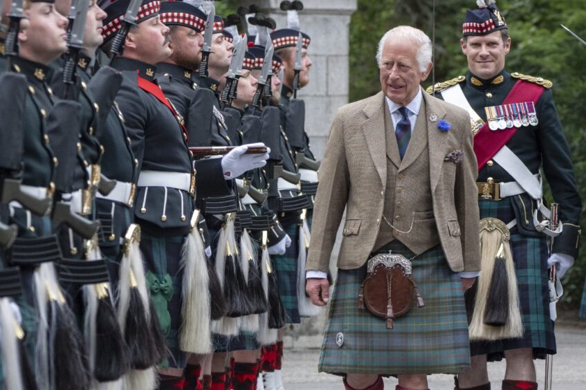 King Charles inspects the Balaklava Company, 5th Battalion, The Royal Regiment of Scotland, at the gates of Balmoral