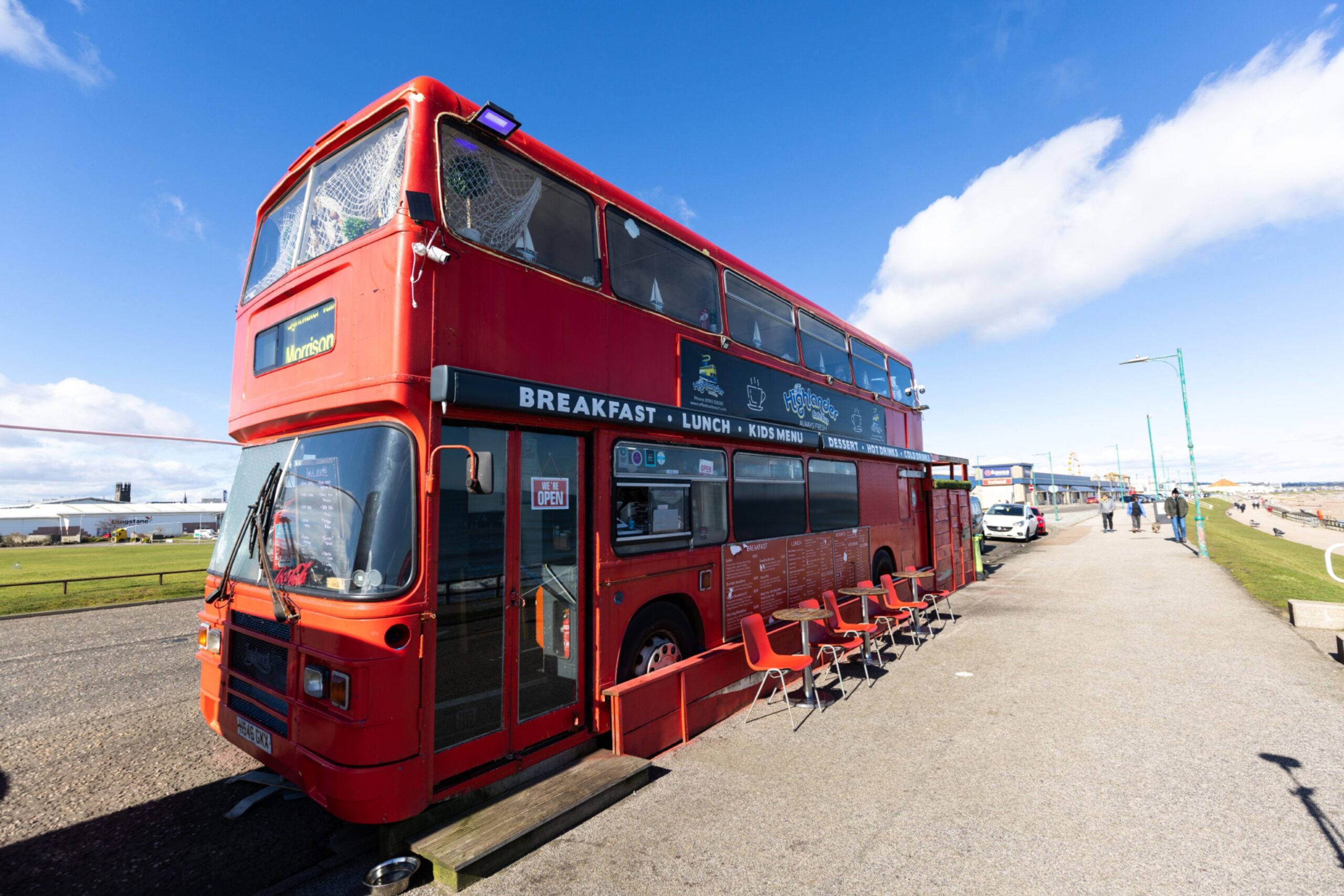 Exterior of the Highlander Café Bus on Aberdeen beach.