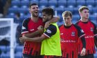 Matthew Cooper celebrates with Rabin Omar after Elgin City's win over Dundee in 2019. Image: SNS