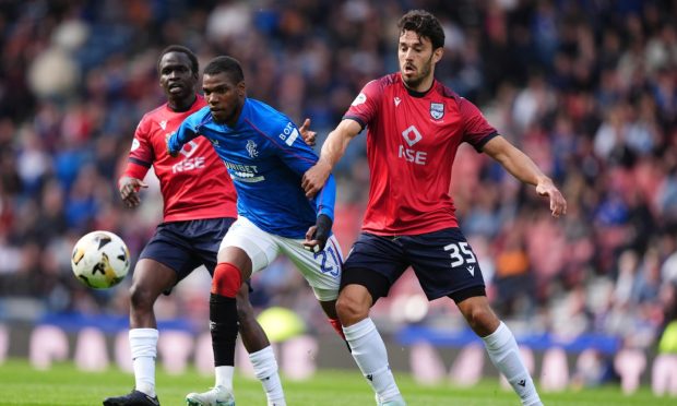 Ross County defender Will Nightingale in action against Rangers.